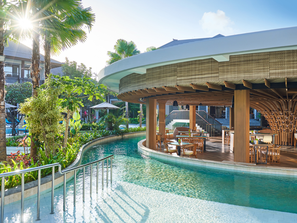 View of the Pool and the Dapur Santai restaurant at Marriott's Bali Nusa Dua Gardens